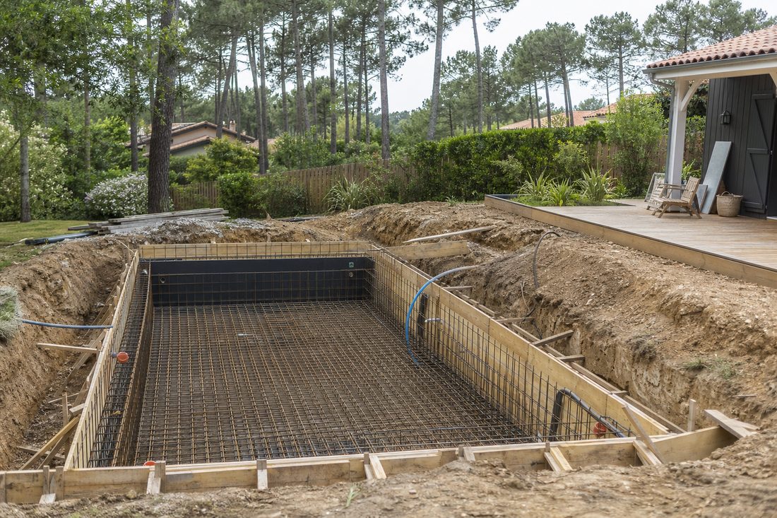 Chantier de construction de piscine à Objat